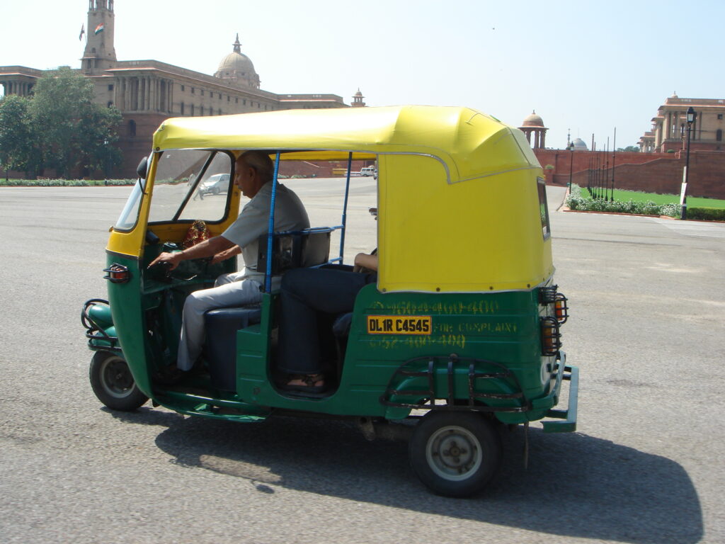 Tricia's rickshaw in front of the Viceroy's house and South Block
